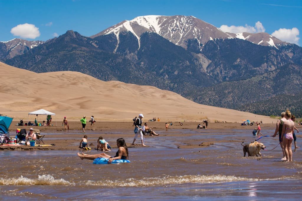 Tourists at Great Sand Dunes National Park and Preserve