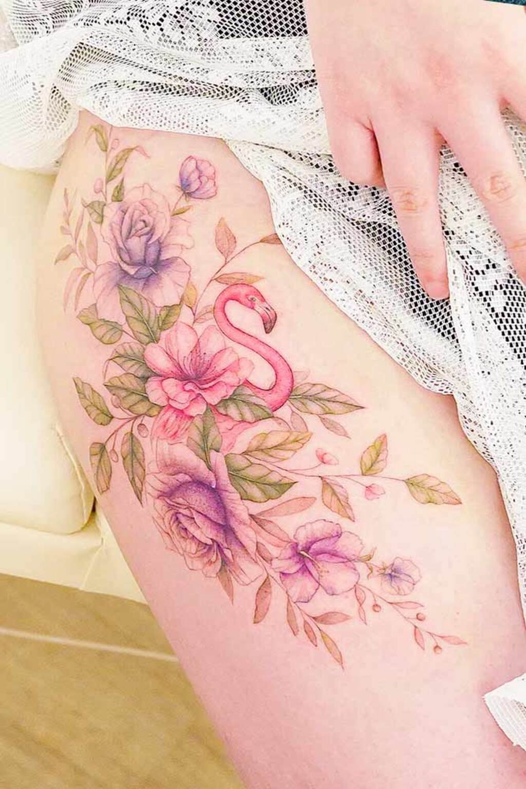 attractive women's small thigh tattoos