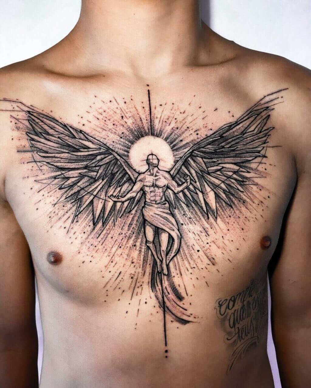 Angel Wings Chest Tattoo
