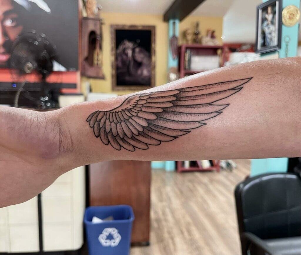 Angel Wings Tattoo On Forearm