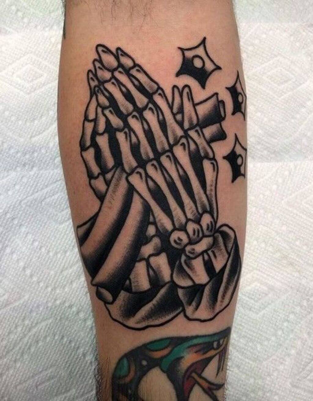 praying hands tattoos