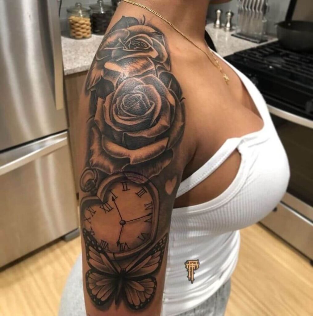 Back and Half Sleeve Tattoo