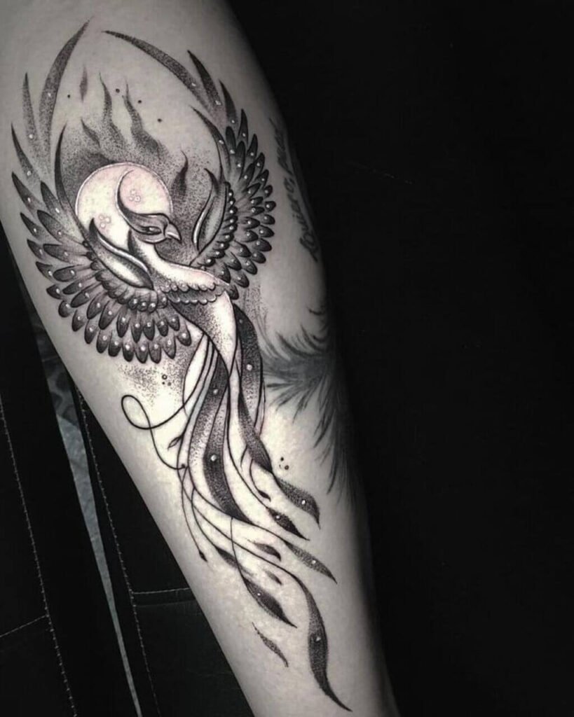 Black and Gray Phoenix Tattoo with Ink Splotches