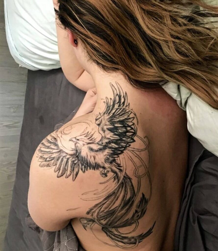 Brush Style Phoenix Tattoo on Woman’s Upper Back