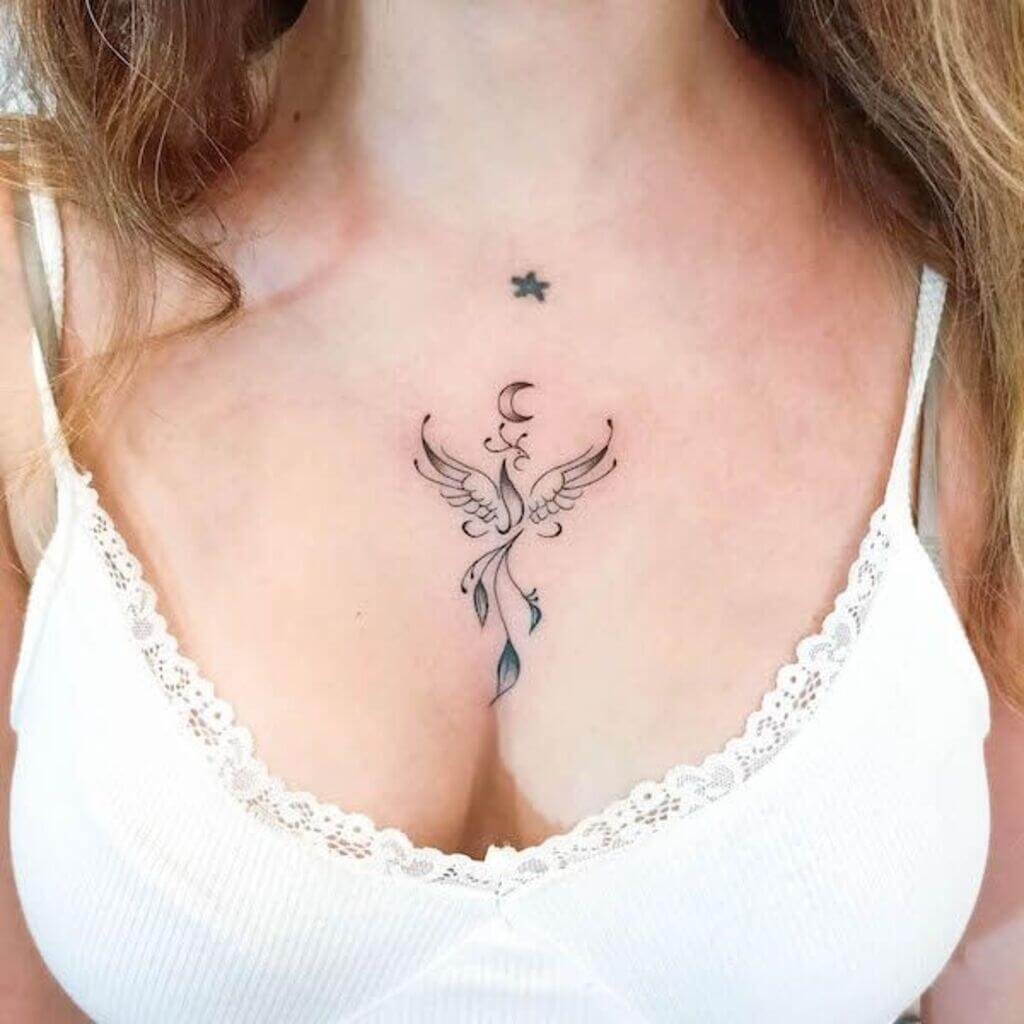 Cute phoenix chest tattoo