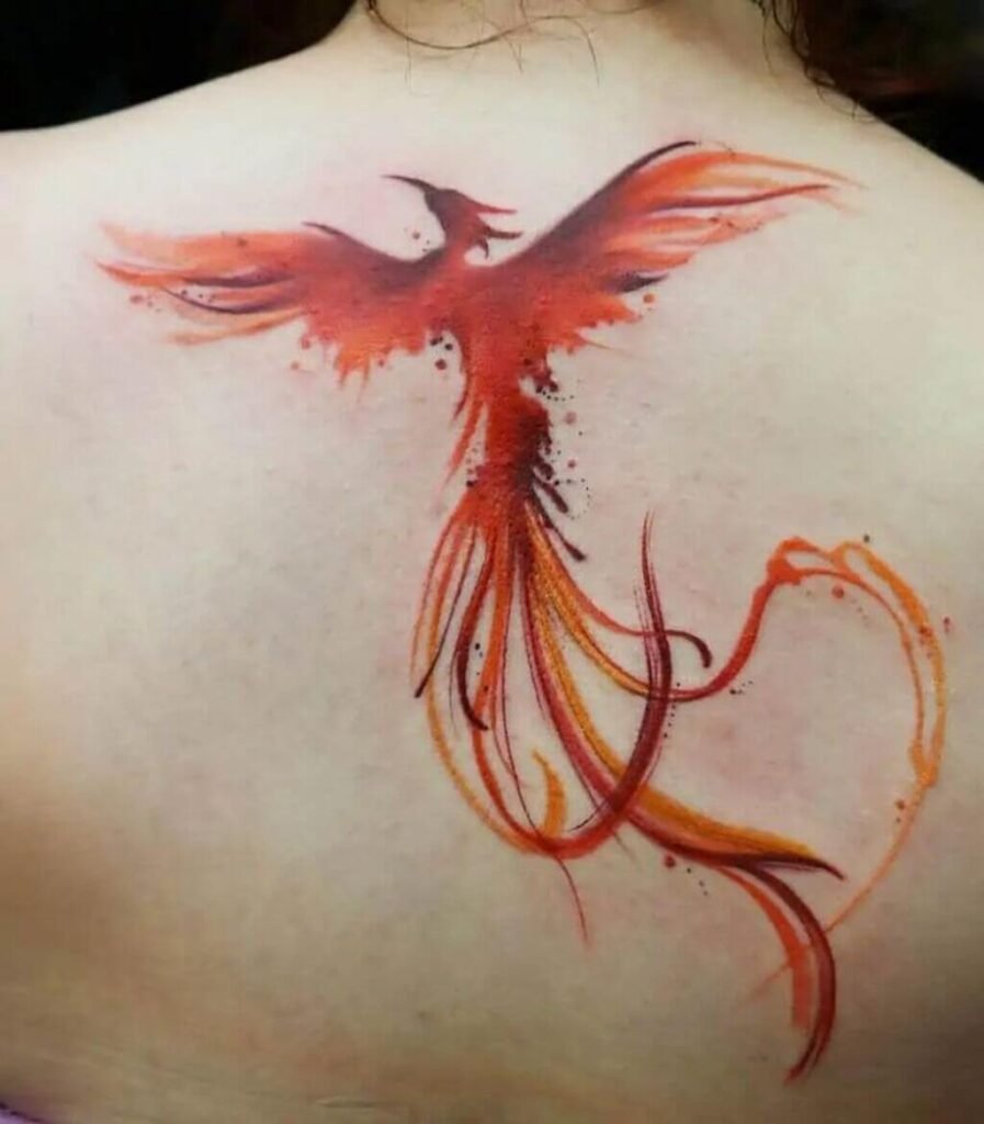 Small watercolor phoenix on the shoulder blade