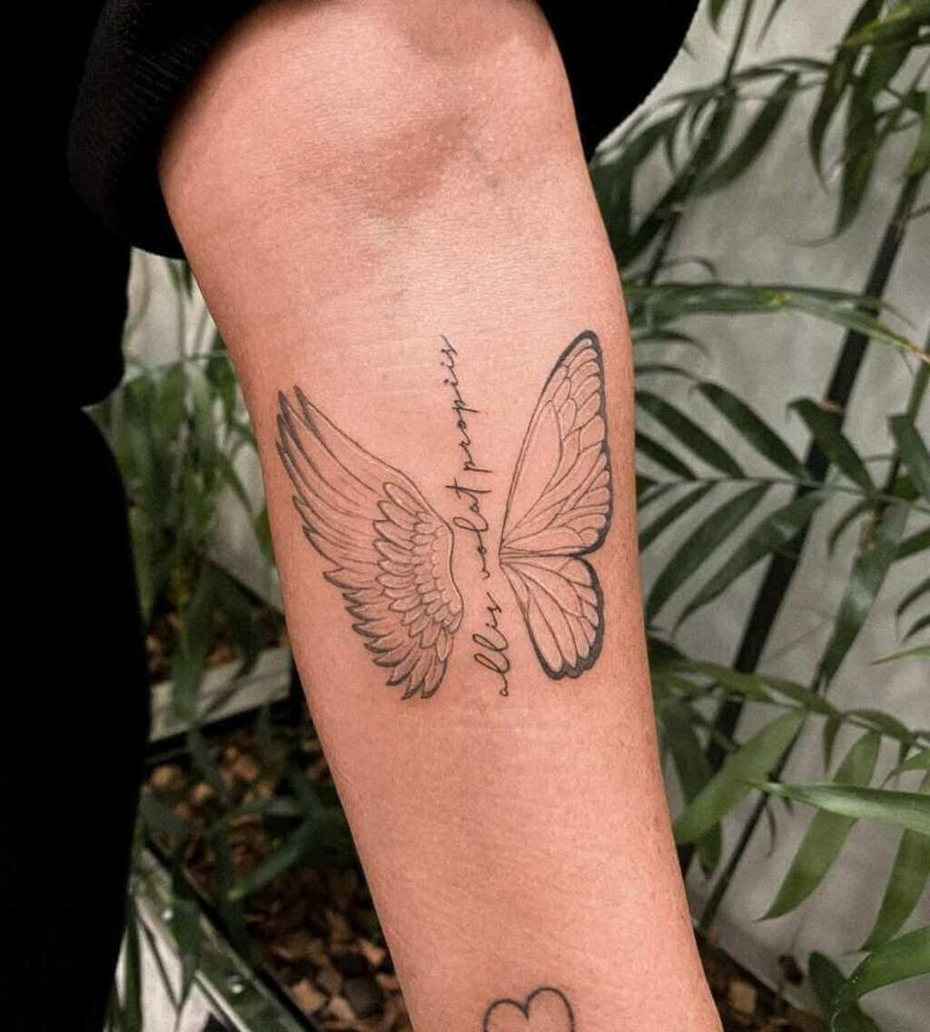 Tattoo of an angel with butterfly wings
