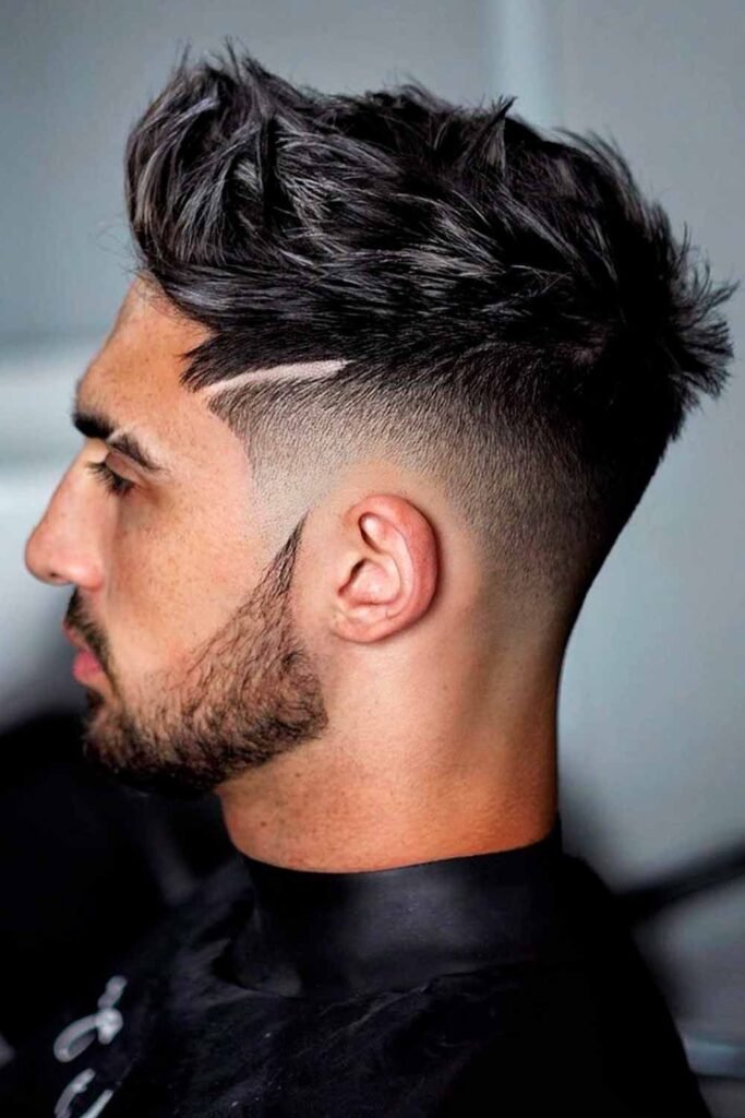 With a drop fade and a spiky fringe