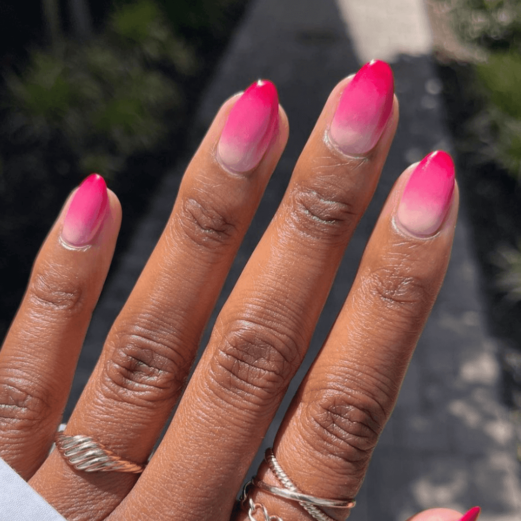 pink and white ombre nails with glitter